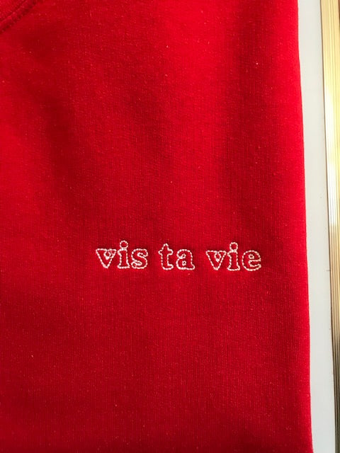 Sweat-shirt brodé unisexe.